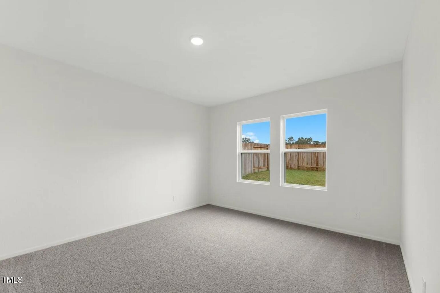 170 Bedstone Way Clayton, NC 27520 - Photo 13 of 22 an empty room with a window