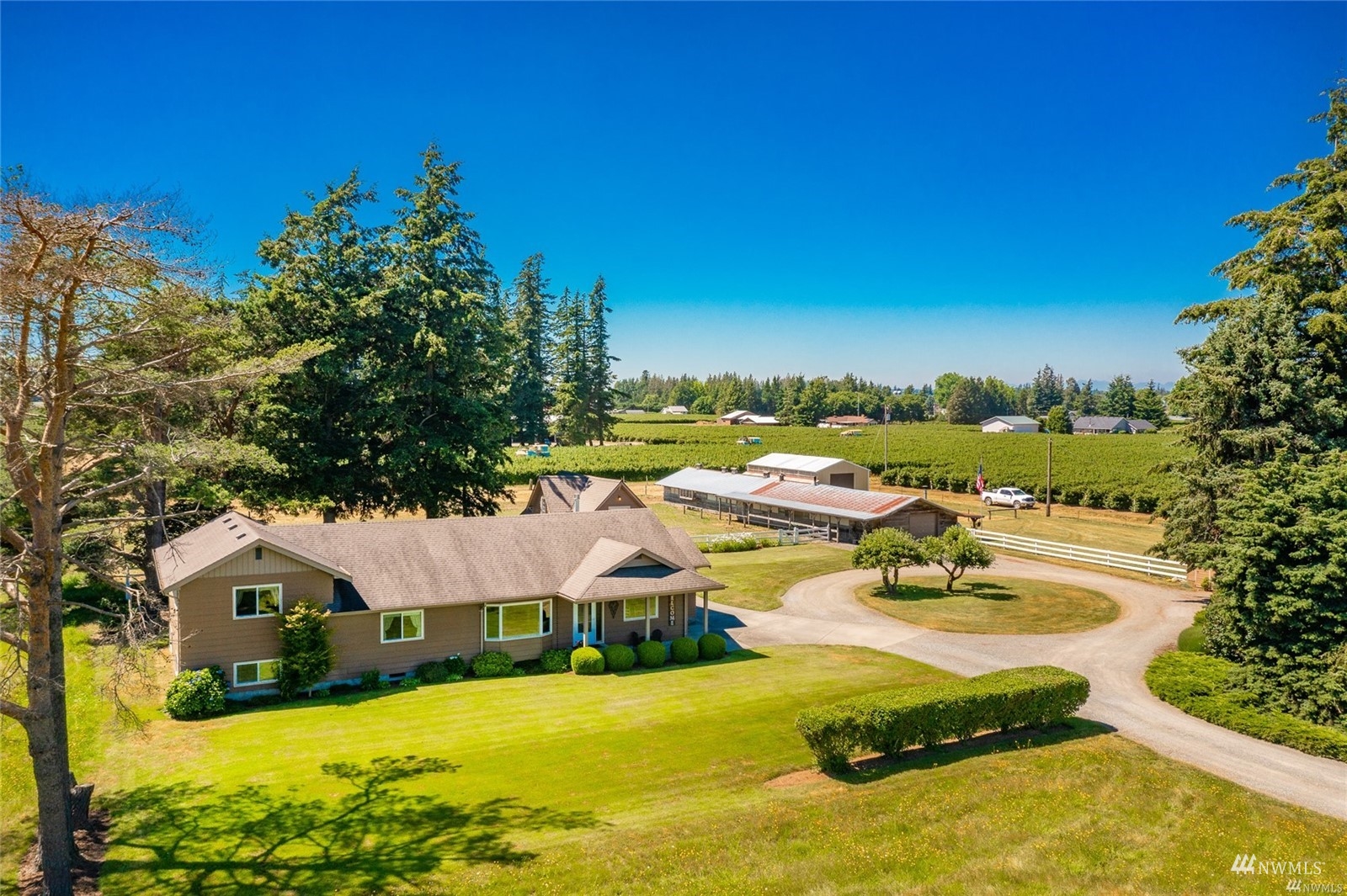 356 East Pole Road Lynden, WA 98264 - Photo 1 of 40 a view of a house with yard and sitting area