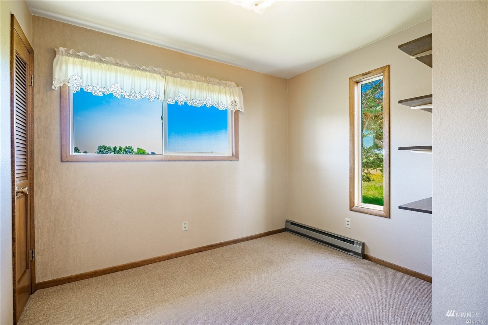 356 East Pole Road Lynden, WA 98264 - Photo 20 of 40 a view of an empty room with a window
