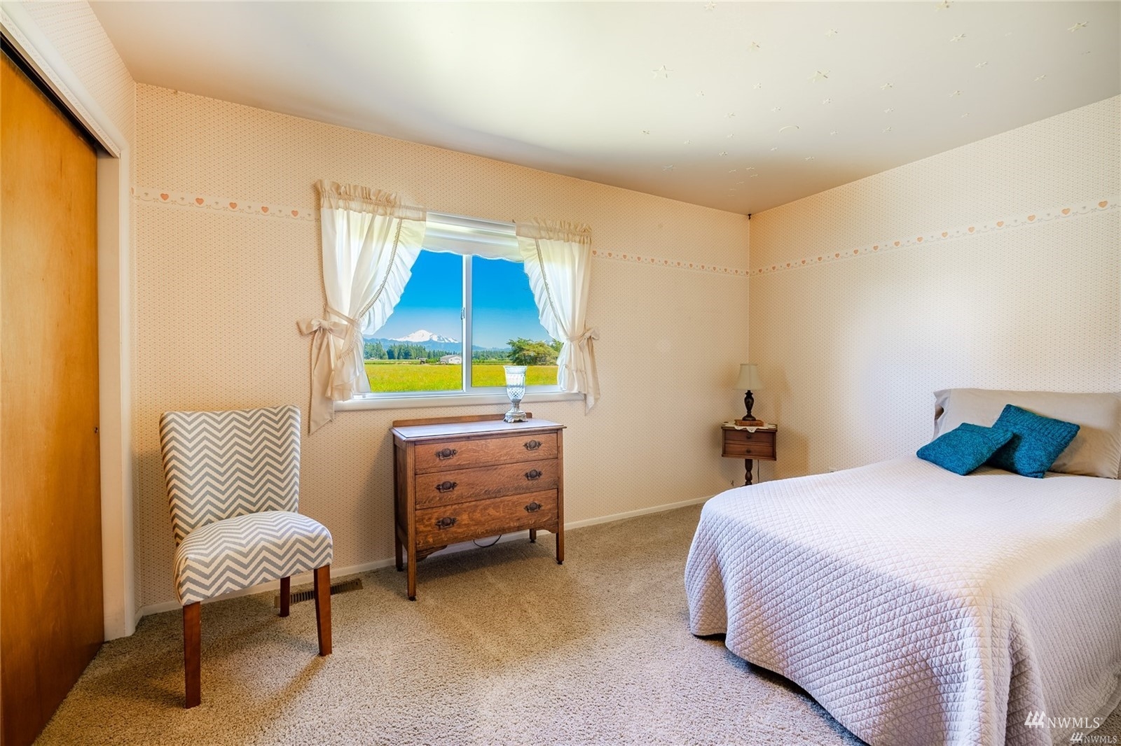 356 East Pole Road Lynden, WA 98264 - Photo 21 of 40 a bedroom with a bed and a couch