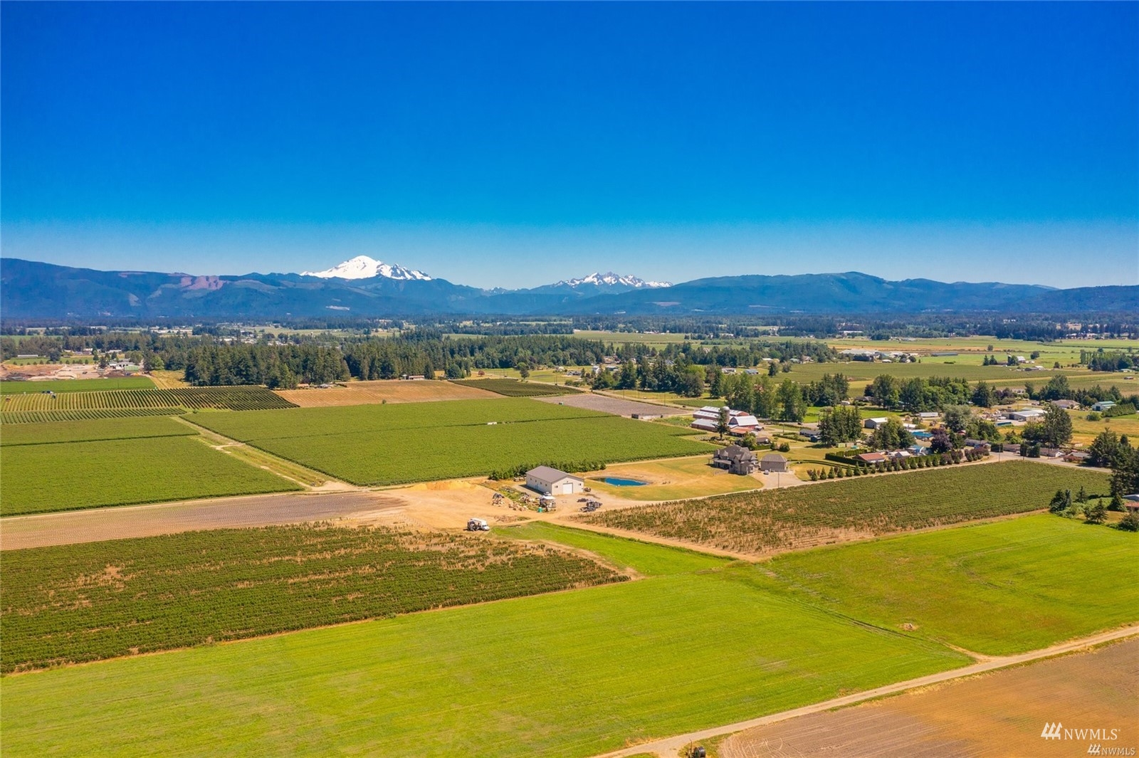 356 East Pole Road Lynden, WA 98264 - Photo 35 of 40 a view of a lake with sunset