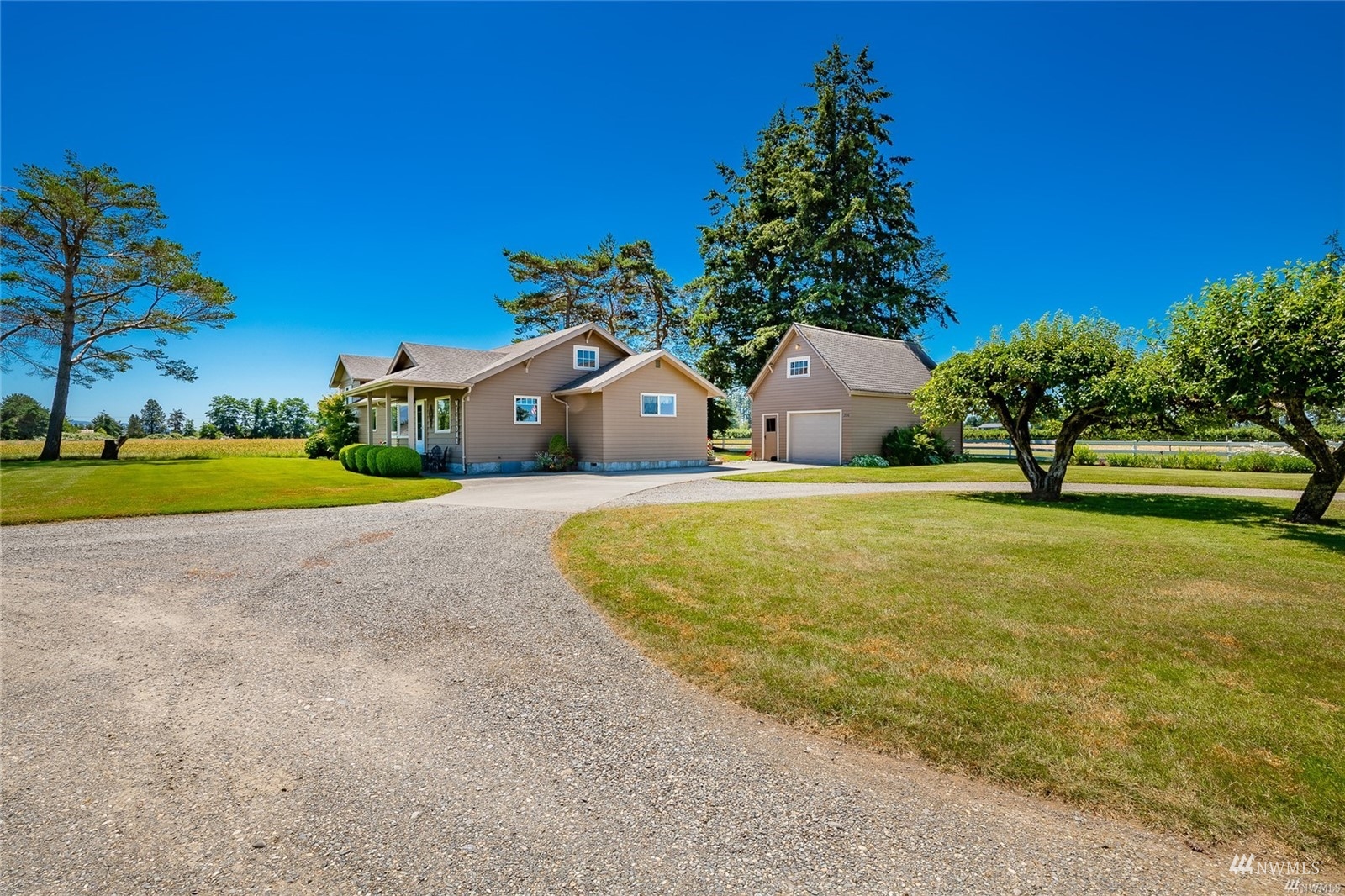 356 East Pole Road Lynden, WA 98264 - Photo 37 of 40 a front view of a house with a yard