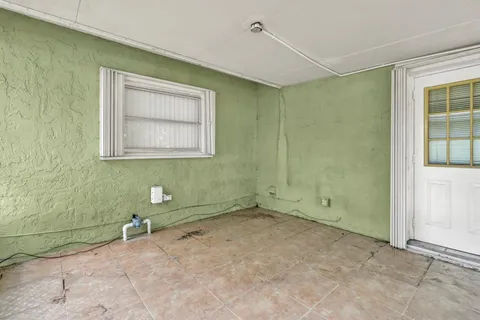 a view of a room with a window