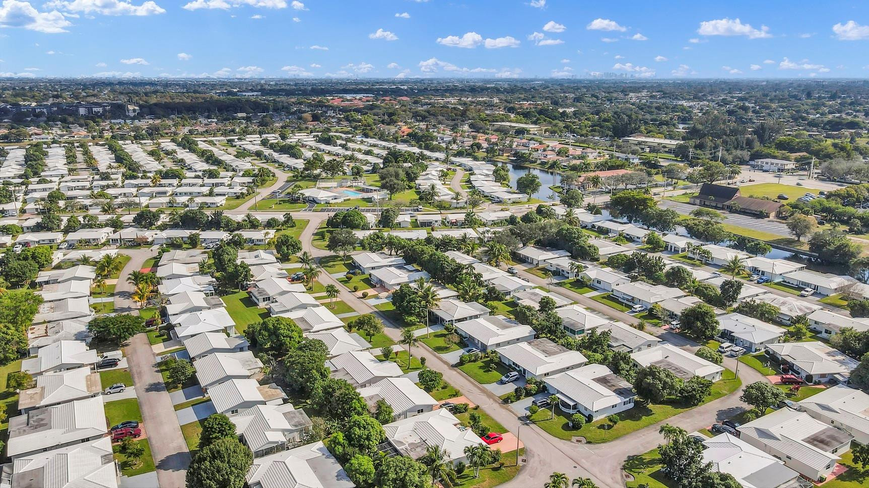 7115 Northwest 73rd Street Tamarac, FL 33321 - Photo 36 of 46 an aerial view of residential houses with outdoor space
