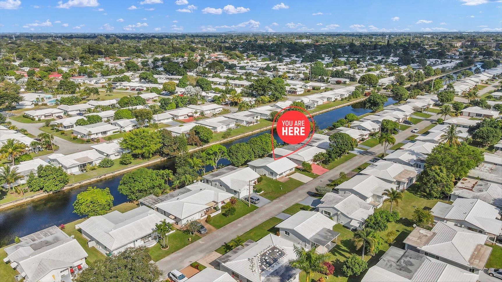 7115 Northwest 73rd Street Tamarac, FL 33321 - Photo 4 of 46 an aerial view of residential houses with outdoor space
