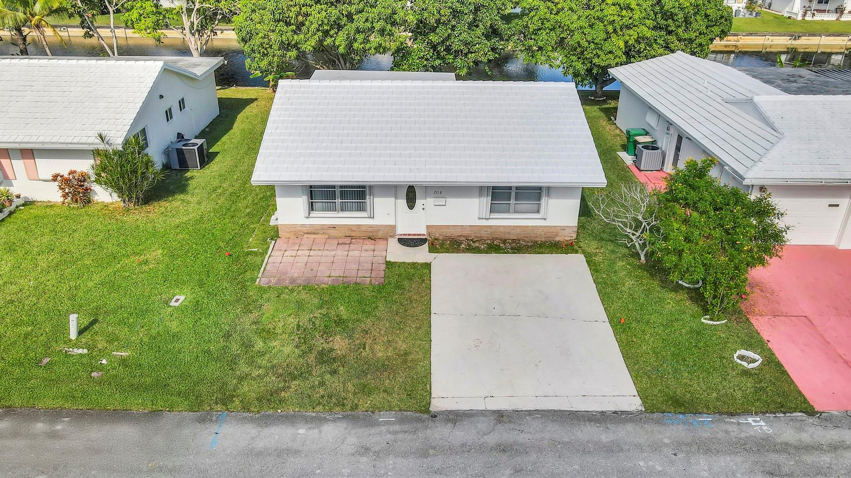 7115 Northwest 73rd Street Tamarac, FL 33321 - Photo 45 of 46 an aerial view of a house