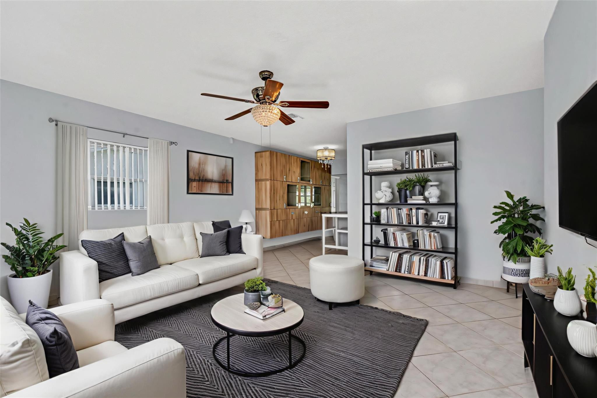 7115 Northwest 73rd Street Tamarac, FL 33321 - Photo 8 of 46 a living room with furniture and wooden floor