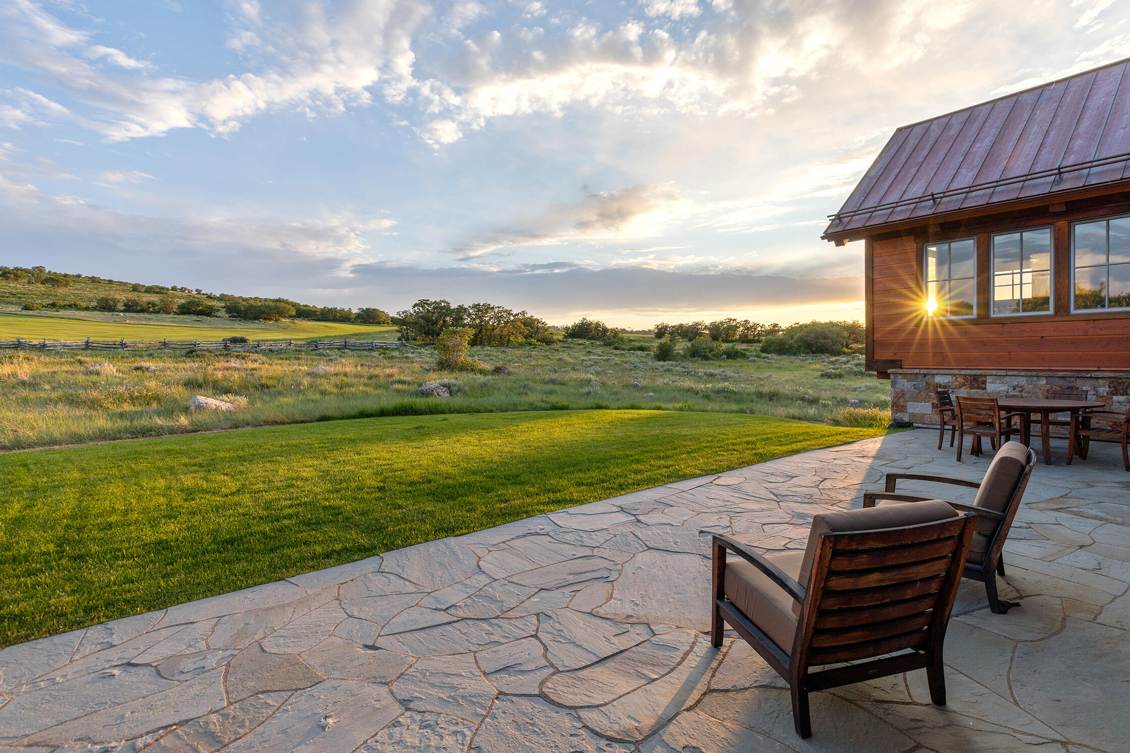 1221 Cornerstone Loop Montrose, CO 81403 - Photo 19 of 44 a view of a patio with a table