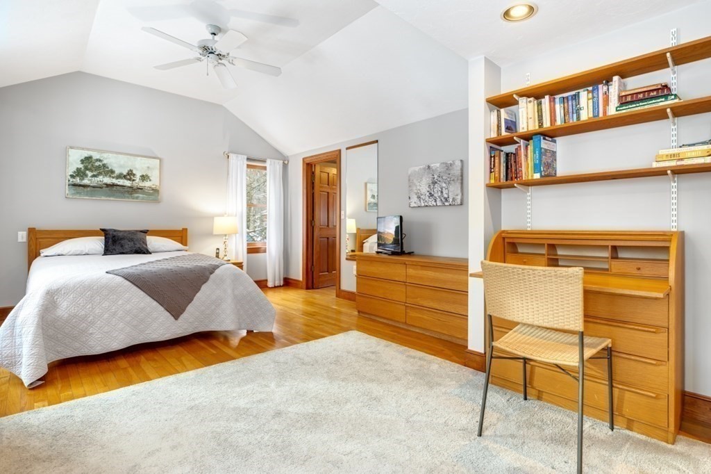 6 Sherman's Bridge Road Wayland, MA 01778 - Photo 20 of 42 a bedroom with a bed and wooden floor