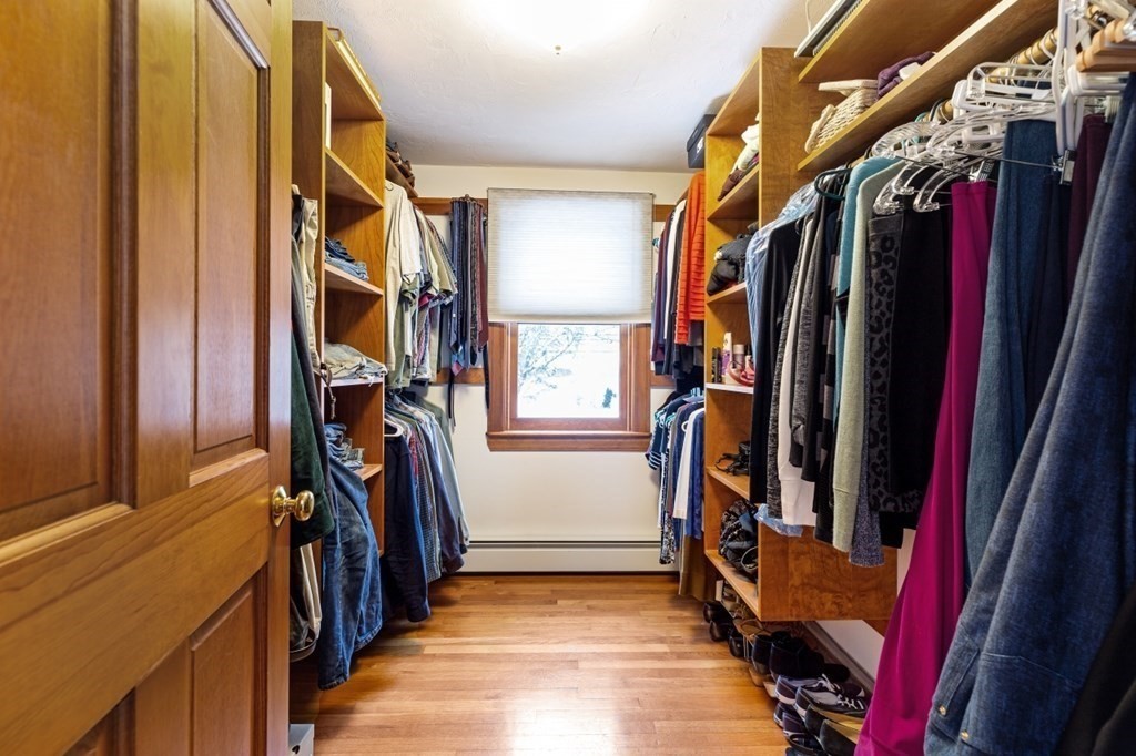 6 Sherman's Bridge Road Wayland, MA 01778 - Photo 21 of 42 a view of walk in closet with clothes