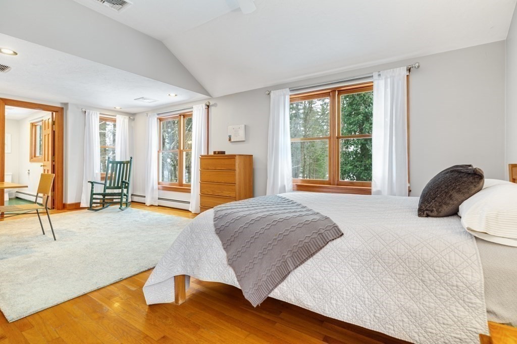 6 Sherman's Bridge Road Wayland, MA 01778 - Photo 22 of 42 a bedroom with furniture and large windows