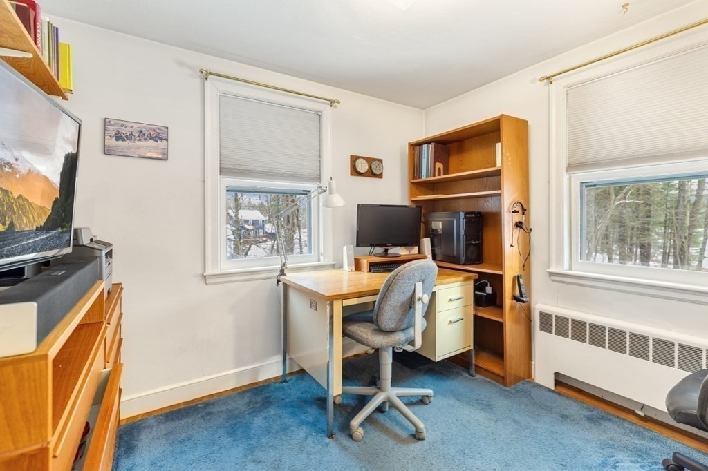 6 Sherman's Bridge Road Wayland, MA 01778 - Photo 28 of 42 a view of a workspace with furniture and a window