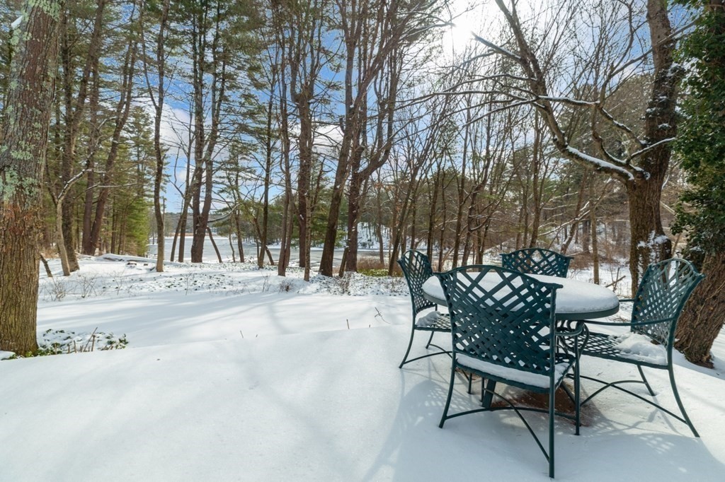 6 Sherman's Bridge Road Wayland, MA 01778 - Photo 31 of 42 a view of a chairs and tables on the roof