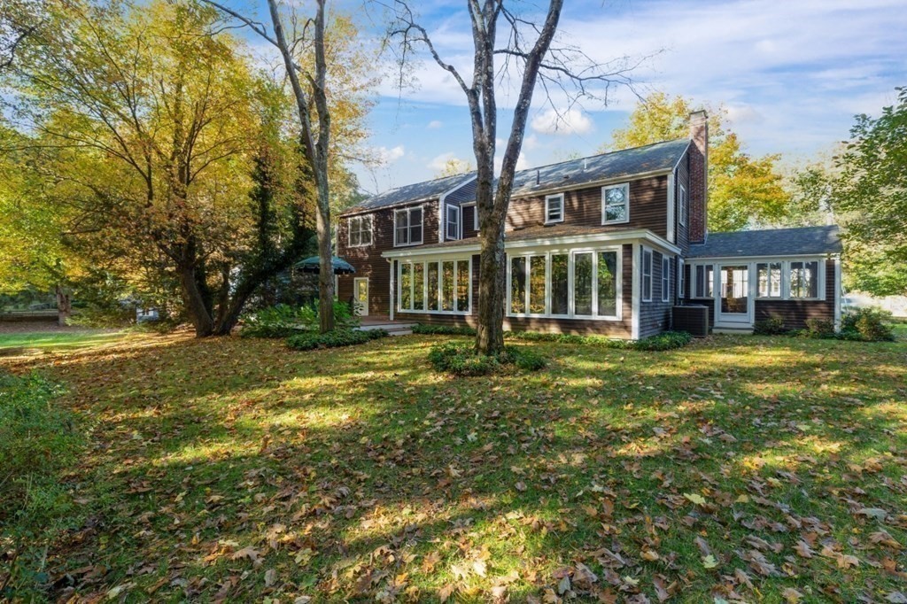 6 Sherman's Bridge Road Wayland, MA 01778 - Photo 36 of 42 a front view of a house with a yard