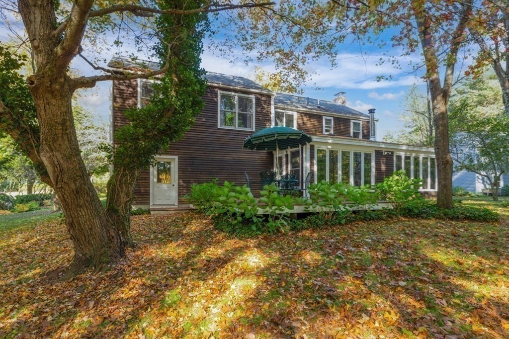 6 Sherman's Bridge Road Wayland, MA 01778 - Photo 37 of 42 front view of a house with a yard