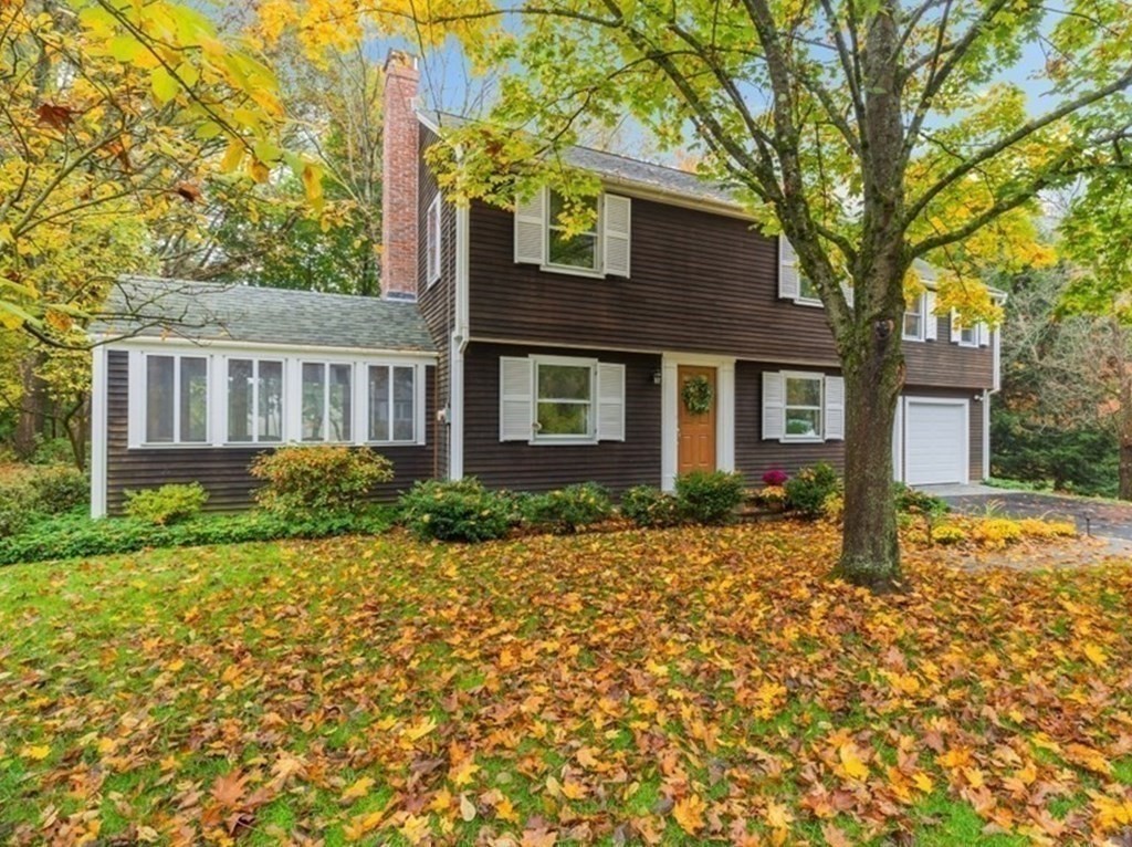 6 Sherman's Bridge Road Wayland, MA 01778 - Photo 39 of 42 front view of a house with a yard
