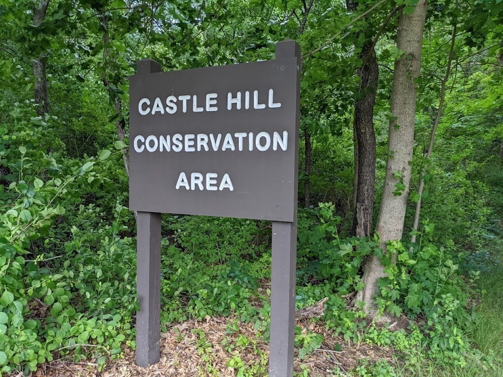 6 Sherman's Bridge Road Wayland, MA 01778 - Photo 40 of 42 a sign broad in front of the red brick house