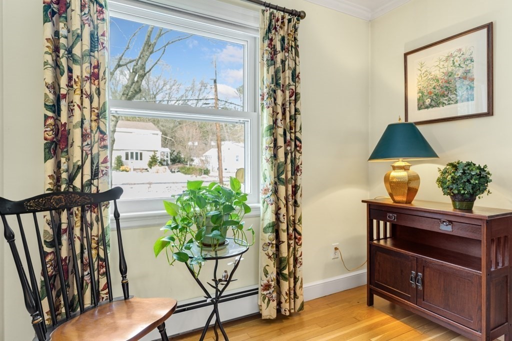 6 Sherman's Bridge Road Wayland, MA 01778 - Photo 6 of 42 a living room with furniture and a potted plant