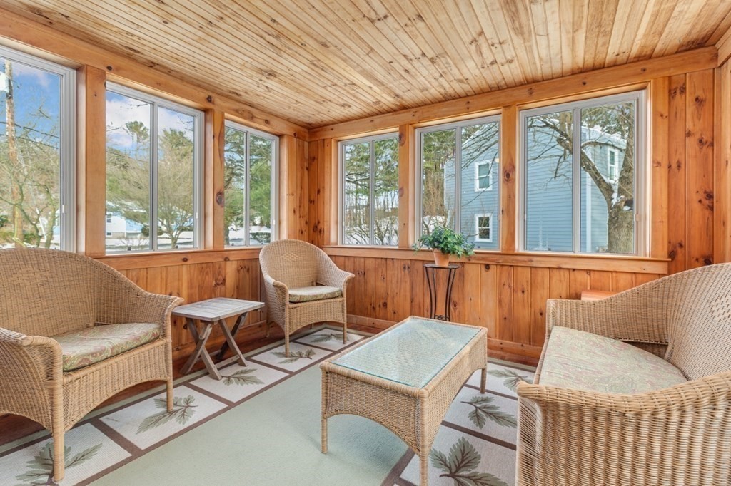 6 Sherman's Bridge Road Wayland, MA 01778 - Photo 7 of 42 a living room with furniture and a large window