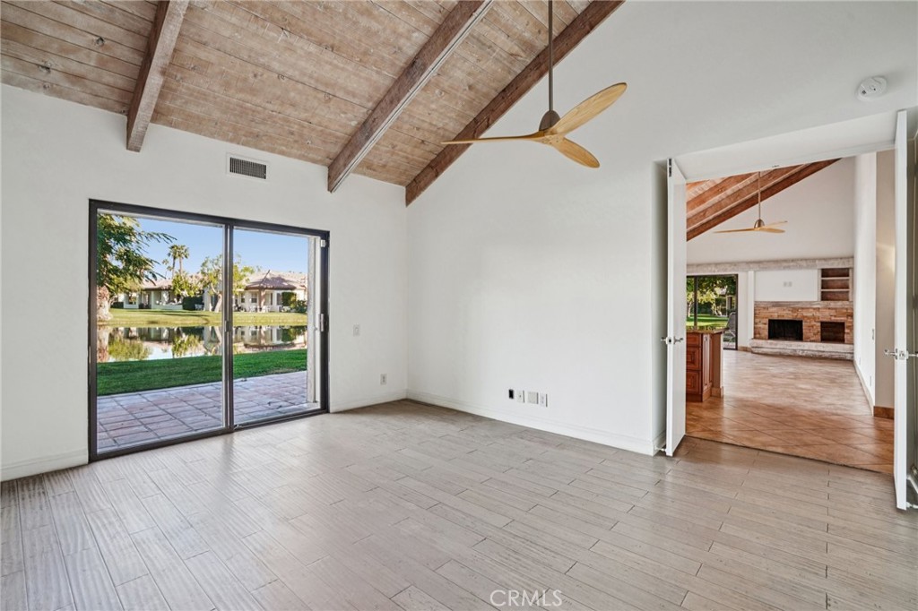 380 Wimbledon Drive Rancho Mirage, CA 92270 - Photo 20 of 41 a view of a room with wooden floor