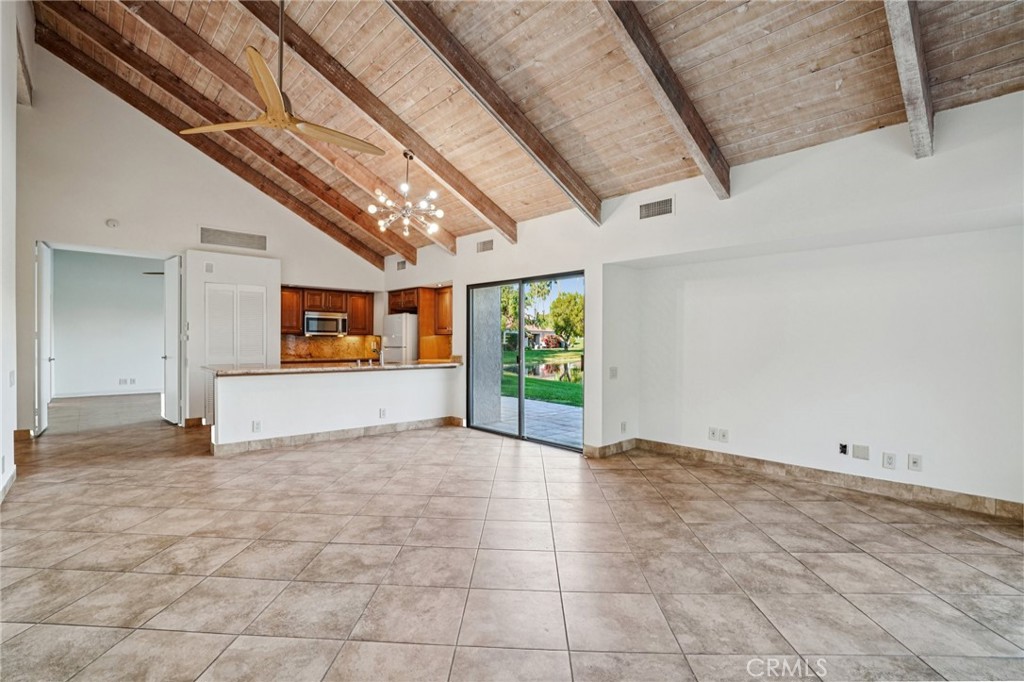 380 Wimbledon Drive Rancho Mirage, CA 92270 - Photo 10 of 41 a view of an empty room with a window