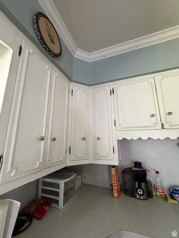 8320 West 3100th Street South Magna, UT 84044 - Photo 14 of 41 Detailed view of white cabinets and crown molding
