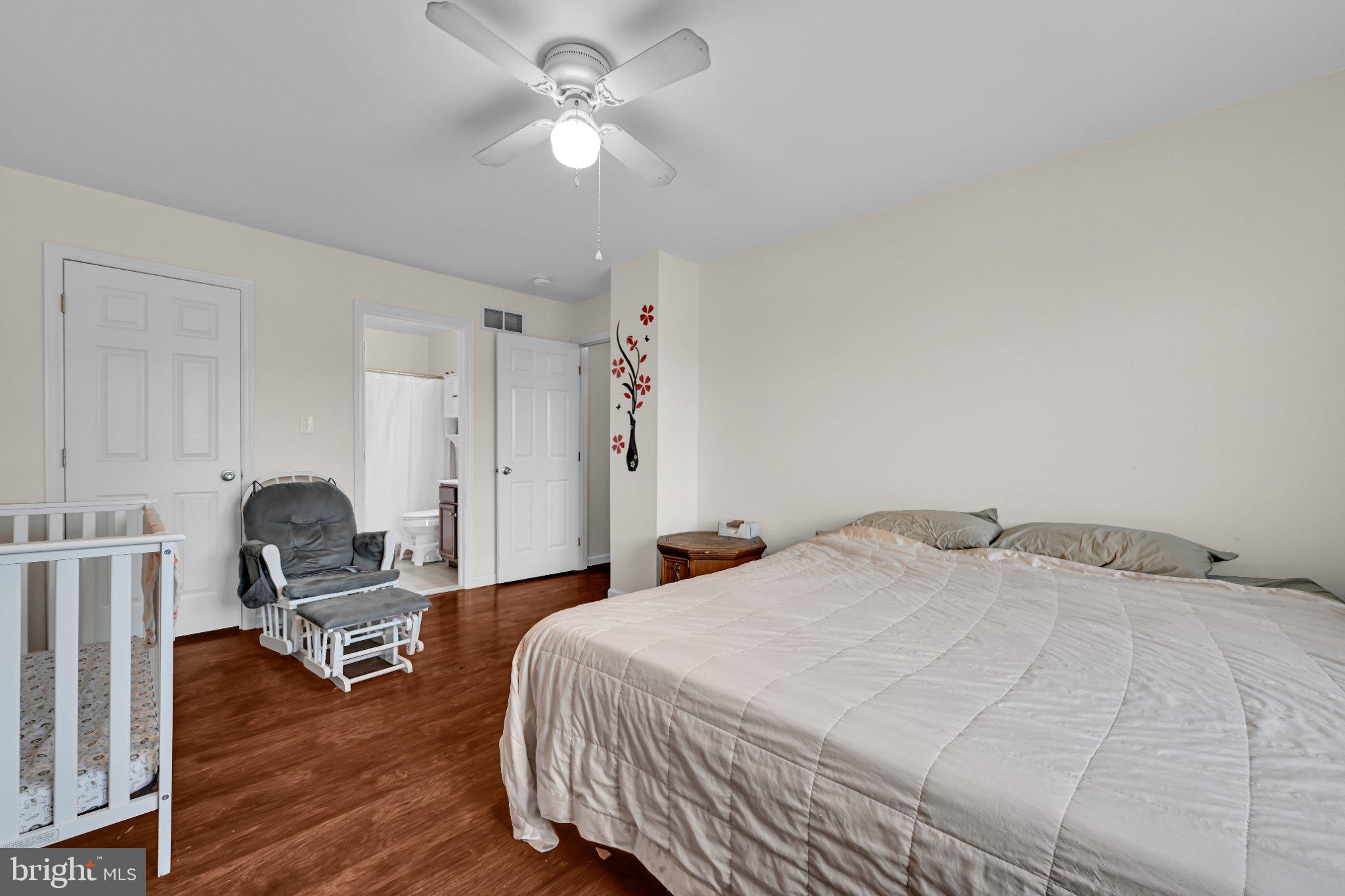 387 Oneida Drive Reading, PA 19608 - Photo 17 of 27 Serene bedroom with warm wood floors.