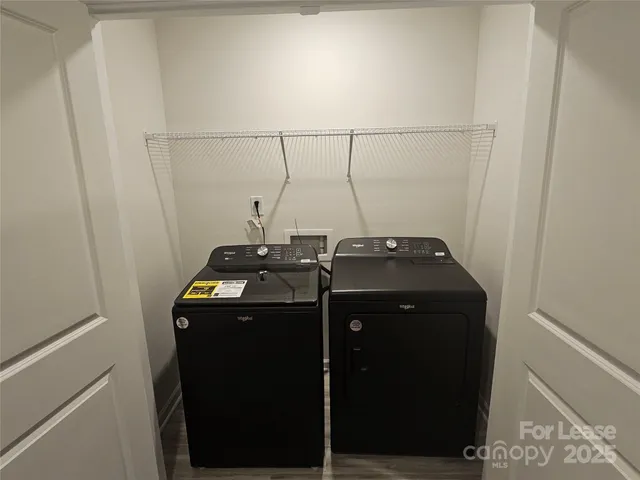 a utility room with dryer and washer