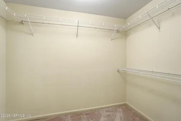 a view of a room with racks on the wall