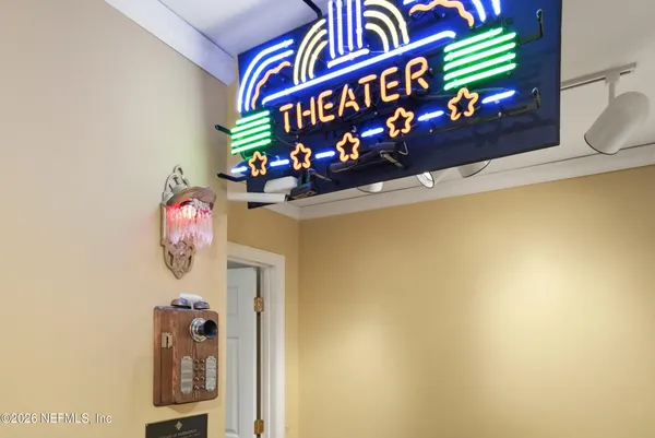 a room with furniture and a chandelier