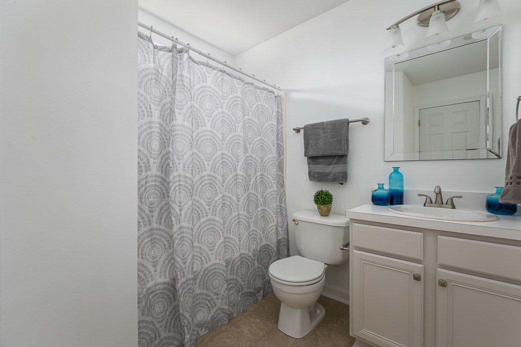 5400 Cahaba Way Raleigh, NC 27616 - Photo 8 of 13 The Guest Bath has fresh paint and NEW FIXTURES. Guest Bathroom
