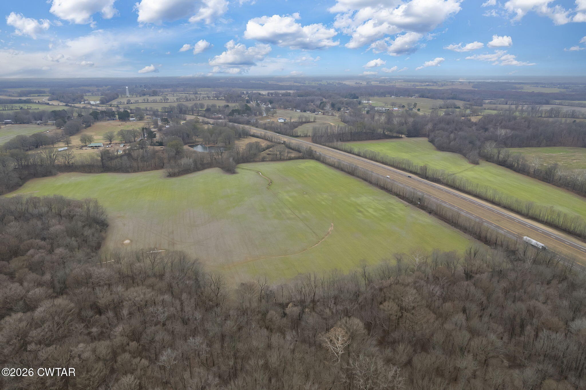 4286 Sorrell Chapel Road Dyersburg, TN 38024 - Photo 2 of 23 a view of a lake with a city