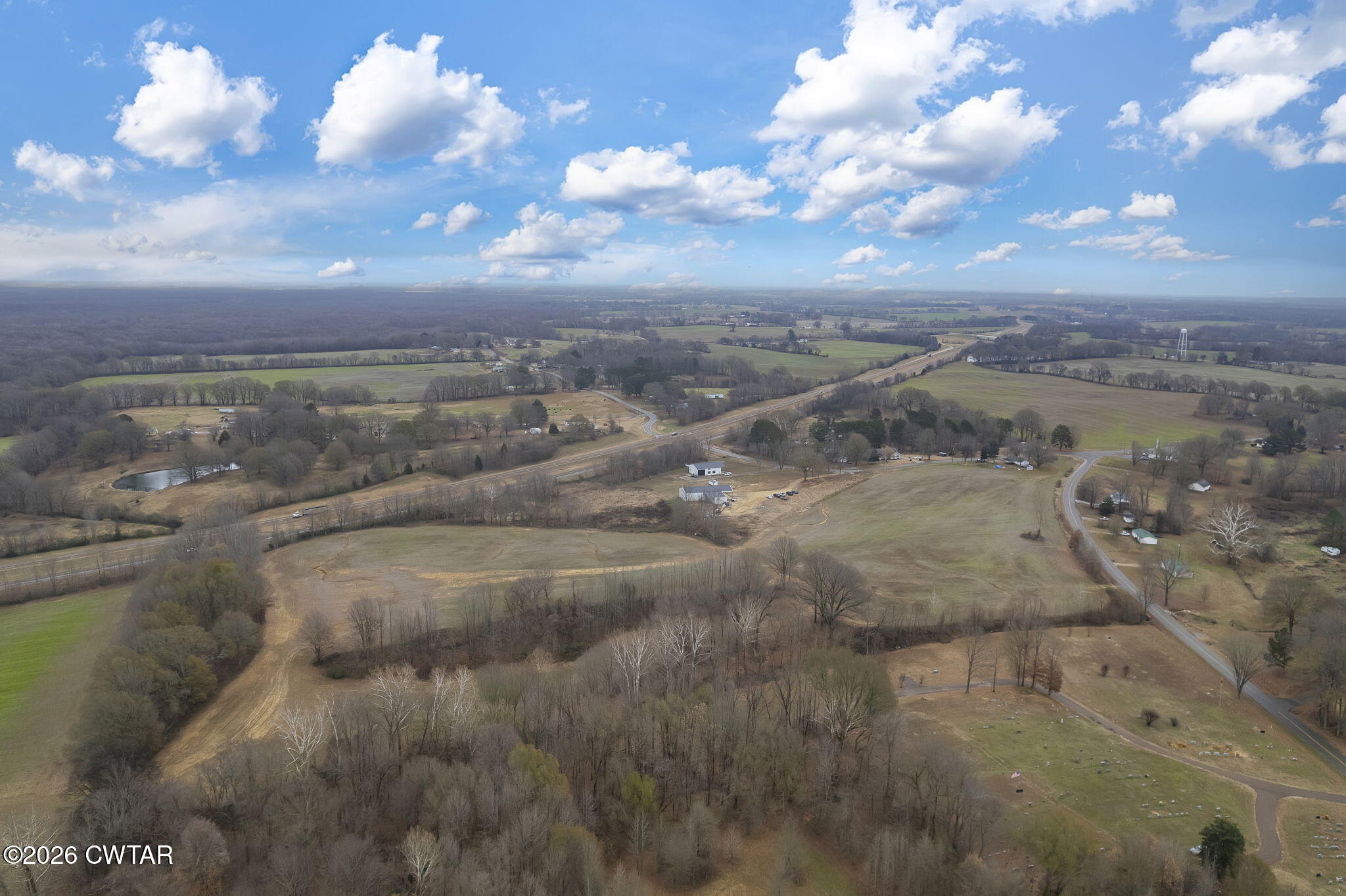 4286 Sorrell Chapel Road Dyersburg, TN 38024 - Photo 7 of 23 a view of a lake with a city
