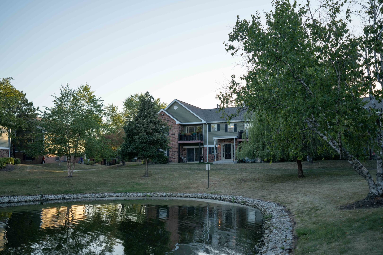 1324 McDowell Road, Unit 203 Naperville, IL 60563 - Photo 2 of 19 a view of a house with a yard
