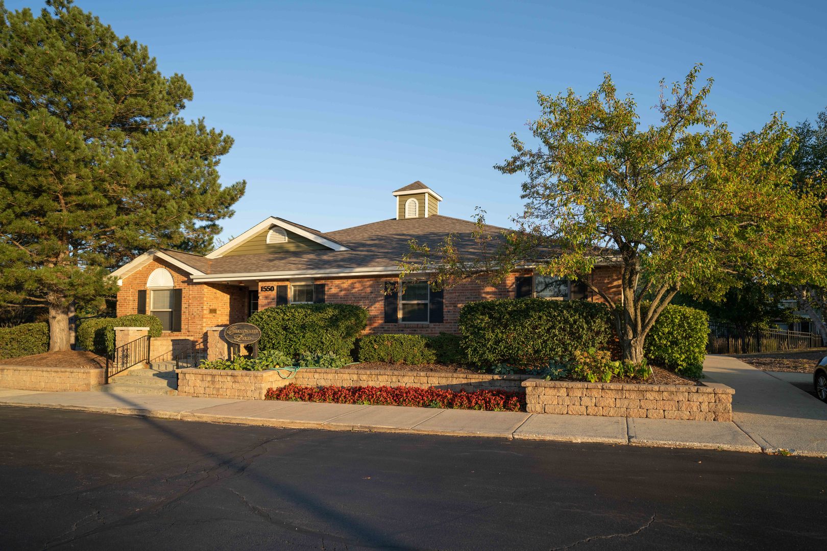 1324 McDowell Road, Unit 203 Naperville, IL 60563 - Photo 18 of 19 a front view of a house with a yard