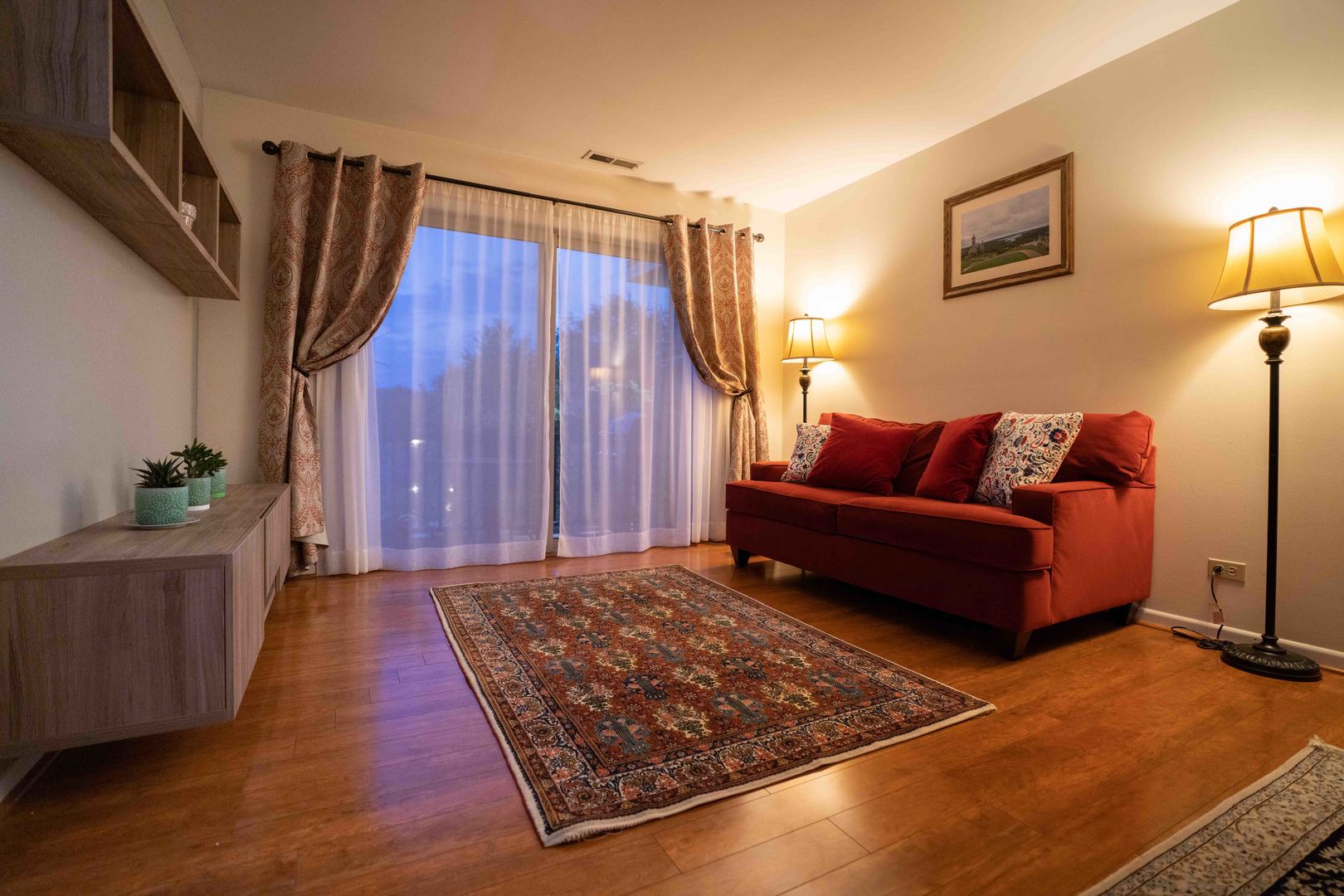 1324 McDowell Road, Unit 203 Naperville, IL 60563 - Photo 5 of 19 a living room with furniture and a rug
