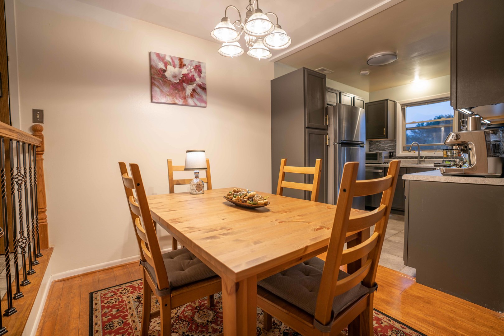 1324 McDowell Road, Unit 203 Naperville, IL 60563 - Photo 10 of 19 a view of a dining room with furniture and chandelier