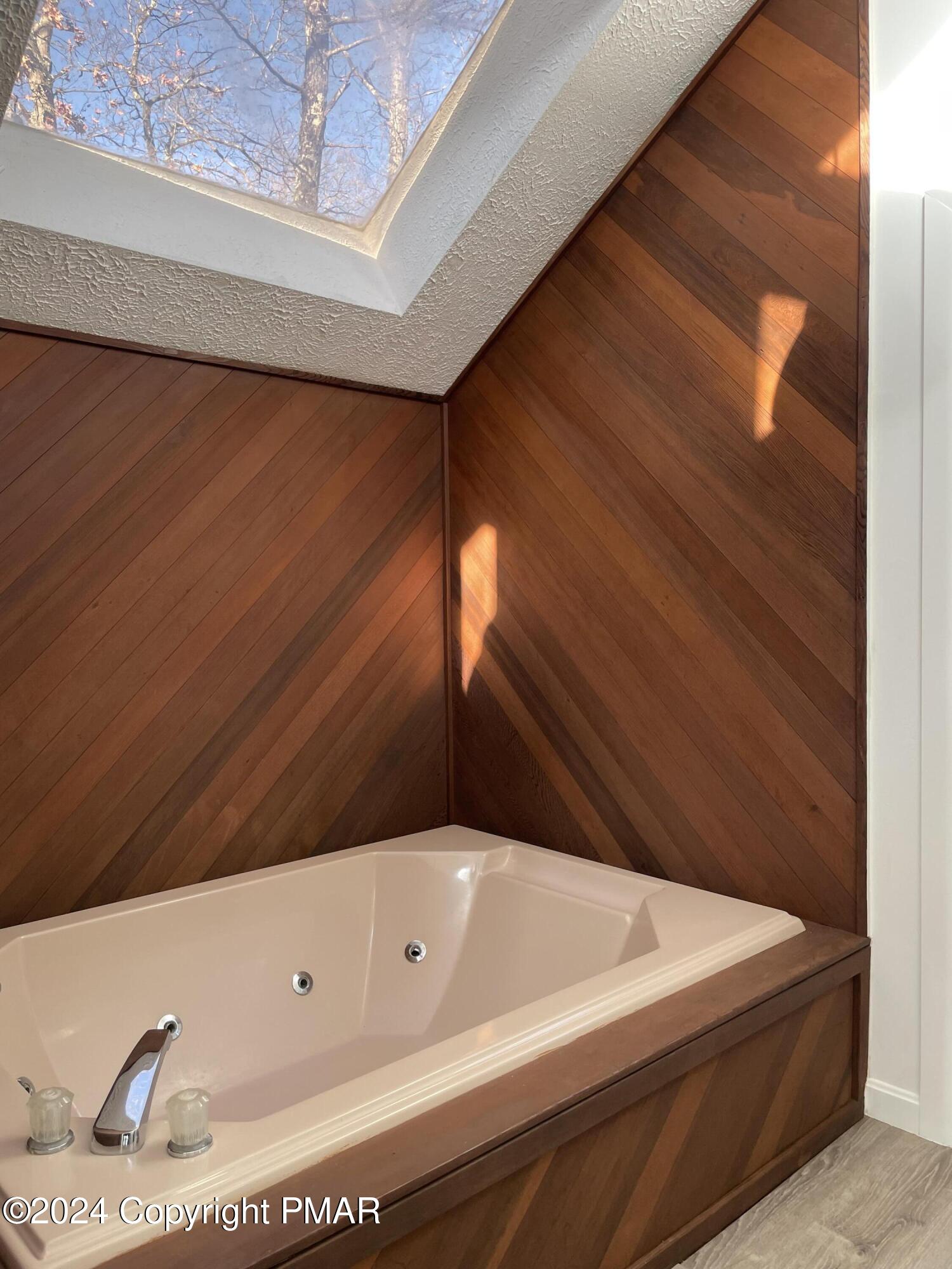 2204 Exeter Court Bushkill, PA 18324 - Photo 22 of 29 a bathroom with a bathtub and shower