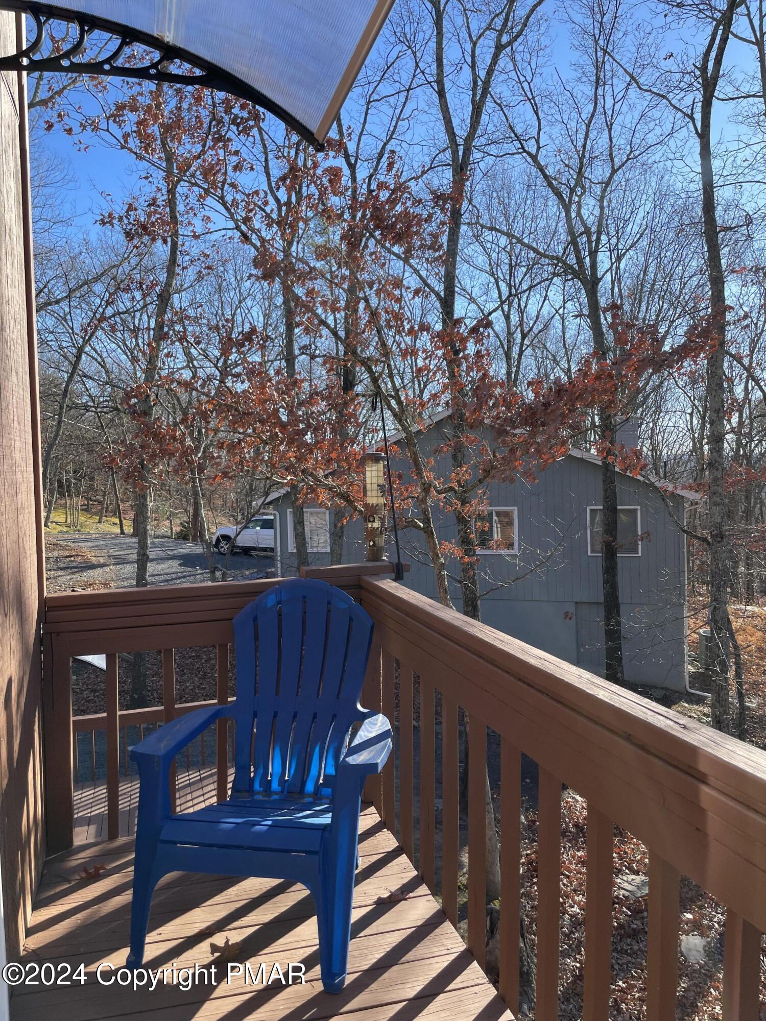 2204 Exeter Court Bushkill, PA 18324 - Photo 24 of 29 a view of a wooden bench in the balcony
