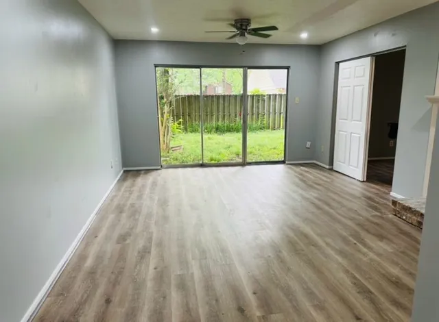a bathroom with a shower and a toilet