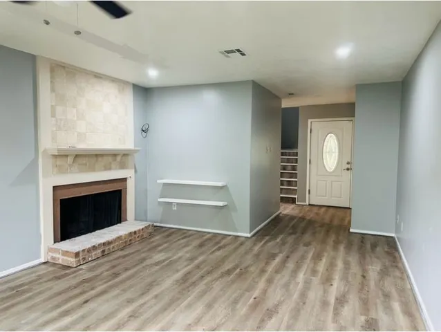 a view of a livingroom with a fireplace
