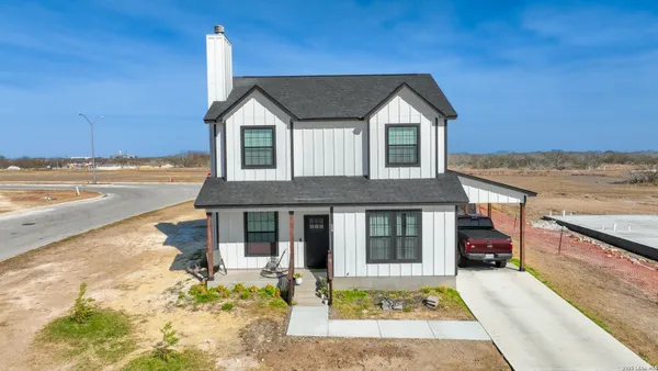 a house view with a outdoor space