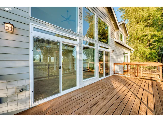 a view of backyard with large windows