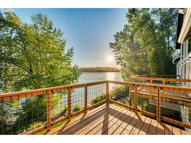 a view of balcony with wooden floor