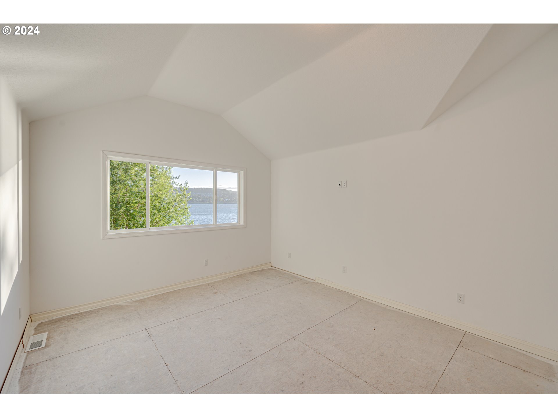 2825 Dike Road Woodland, WA 98674 - Photo 25 of 48 a view of an empty room with a window