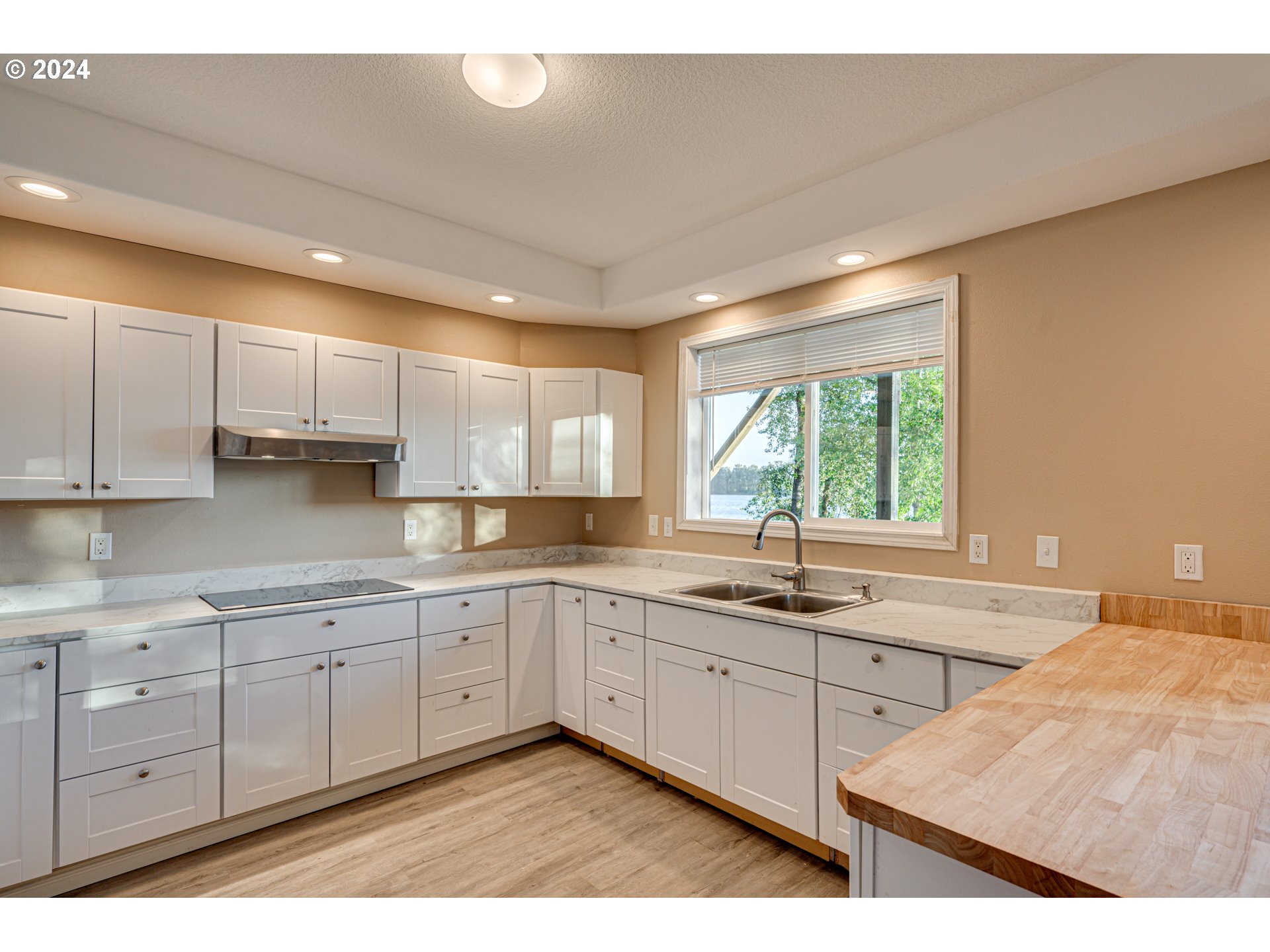 2825 Dike Road Woodland, WA 98674 - Photo 36 of 48 a kitchen with sink cabinets and window