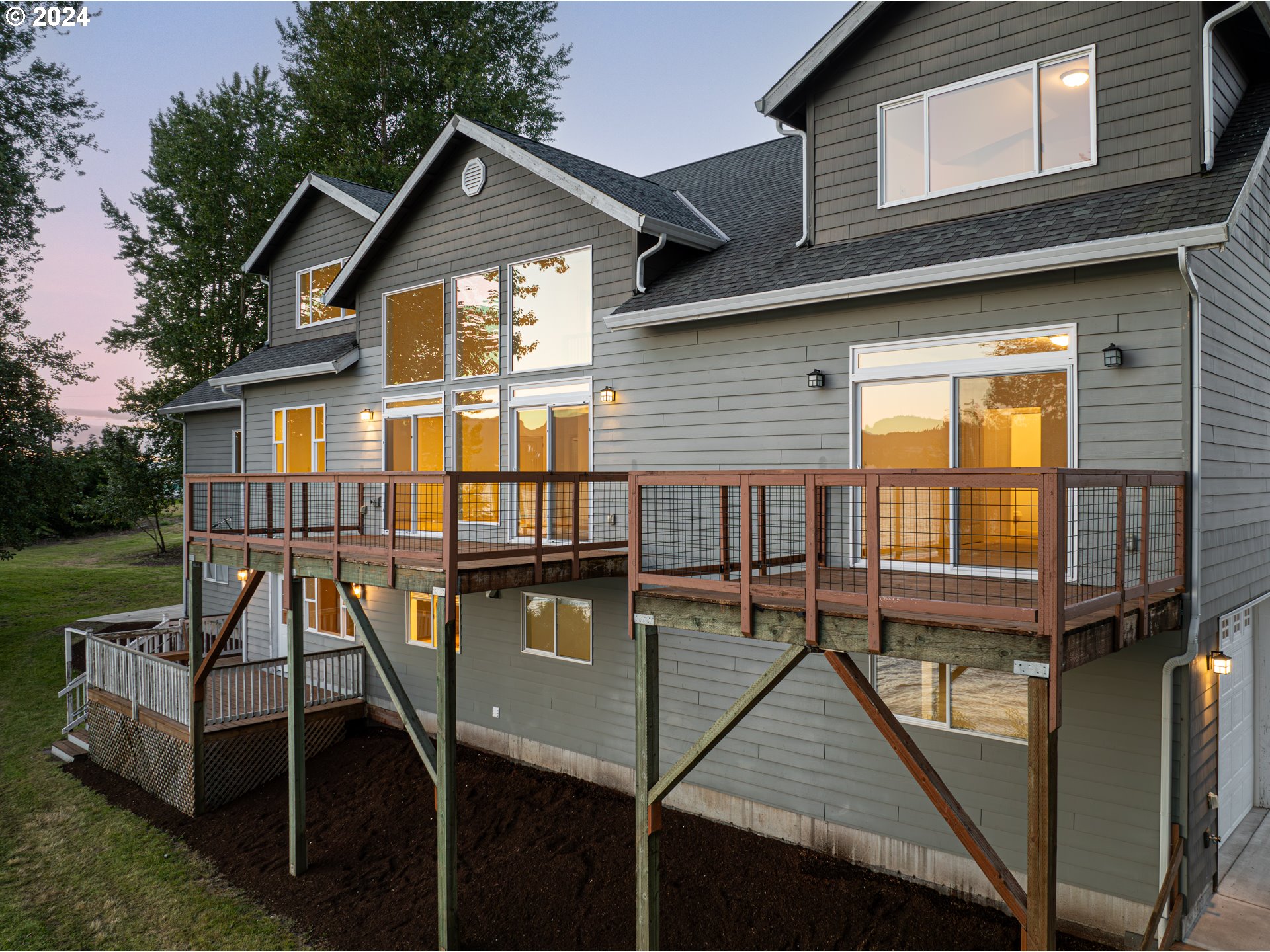 2825 Dike Road Woodland, WA 98674 - Photo 44 of 48 a view of a house with backyard and deck
