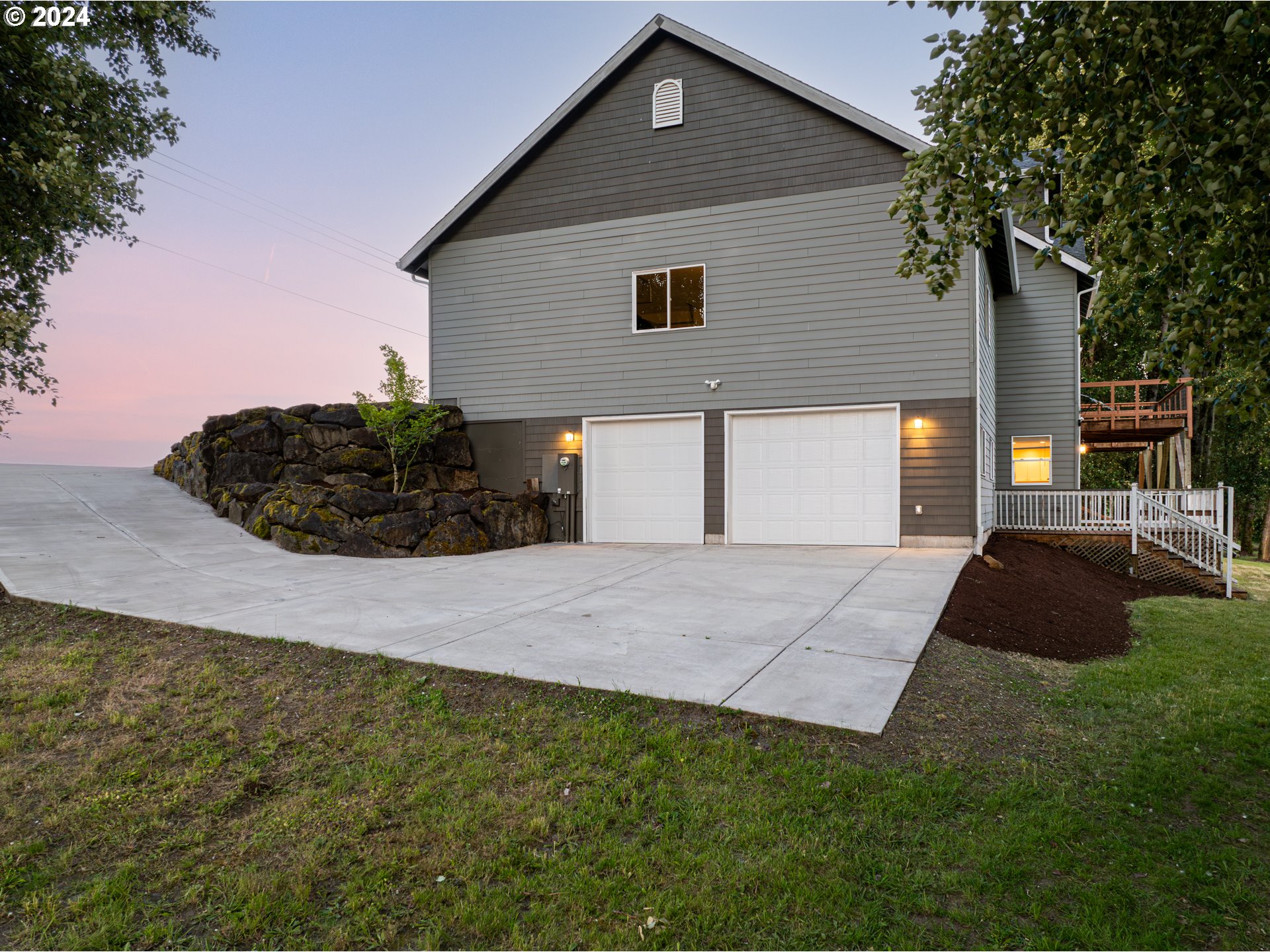 2825 Dike Road Woodland, WA 98674 - Photo 5 of 48 a front view of a house with a yard and garage