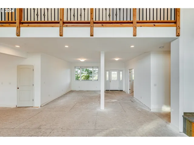 a view of a hallway with entryway