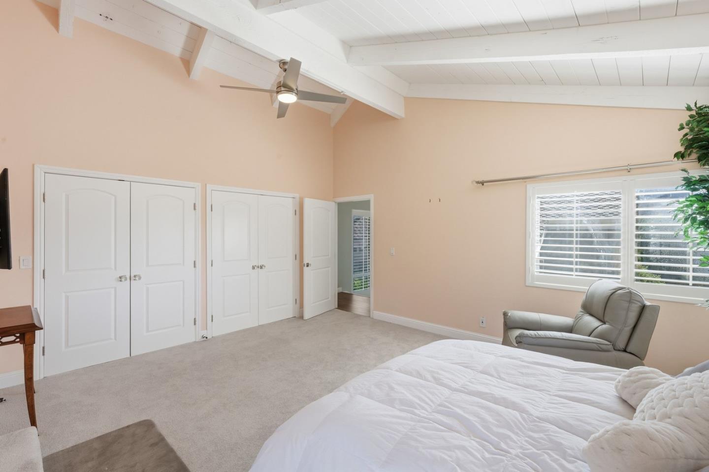 701 Day Valley Road Aptos, CA 95003 - Photo 18 of 43 a bedroom with a large bed and a window